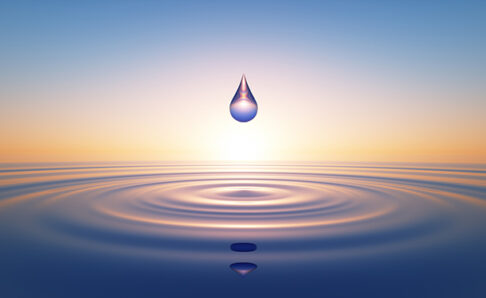 Water Drop in wide calm Ocean