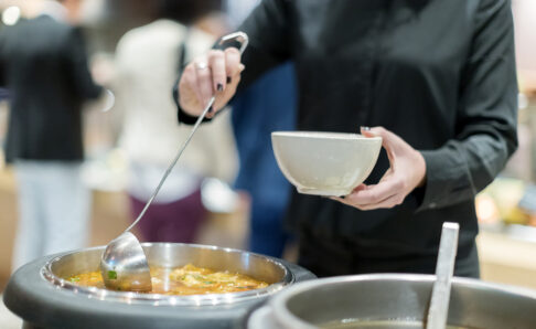 Serving soup in cafeteria